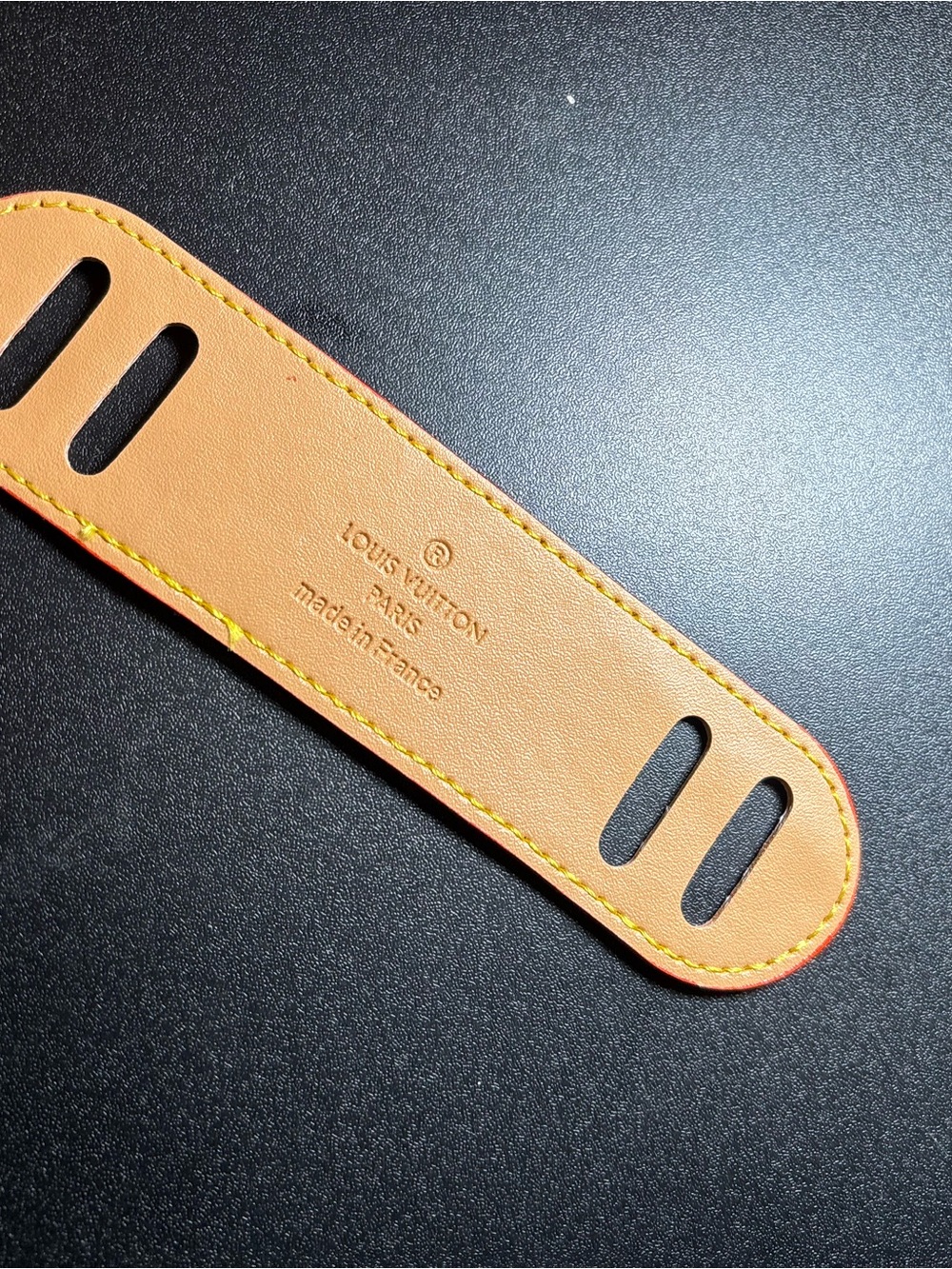 Louis Vuitton Tan Leather Strap with Yellow Stitching and Red Edge